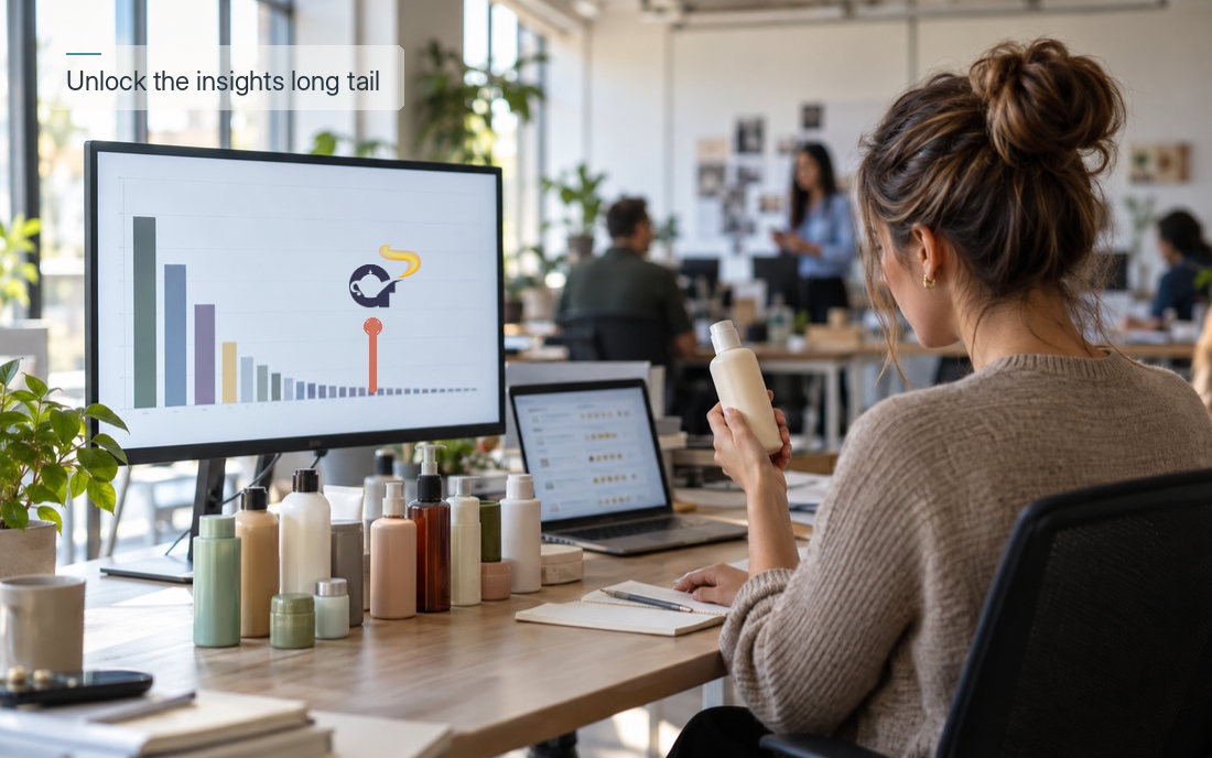 Consumer insights manager comparing haircare products against a long-tail chart of brands on her monitor